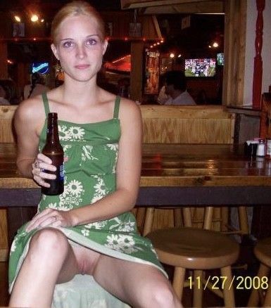 2008 no panties at a bar. Now the world gets to see her pussy.