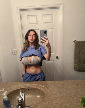 Busty nurse has trouble hiding those big ass titties…