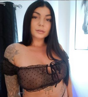 Exposure slut Stephanie showing off in see through top