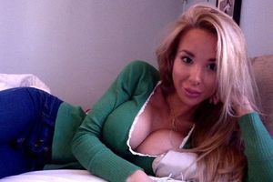 very nice blonde mom on the bed