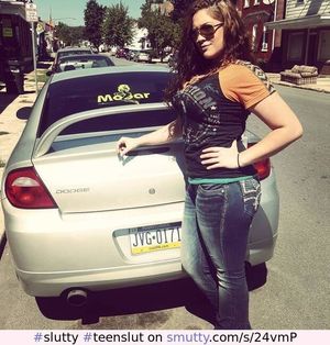 Slutty lil curvaceous teen slut posing by a car