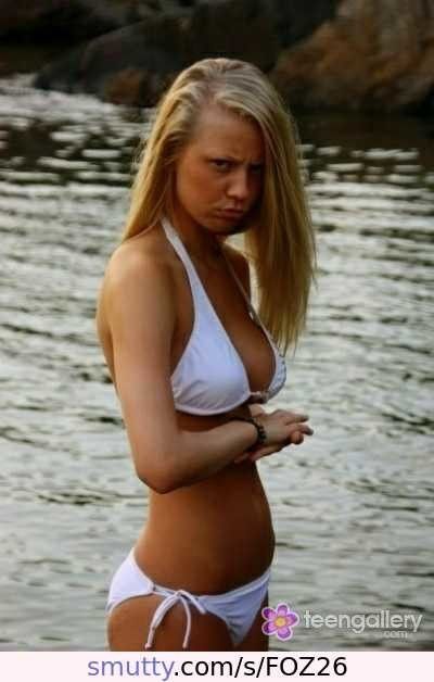 Slutty lil blonde teen slut posing in the lake