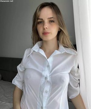 blonde beauty in see-through shirt