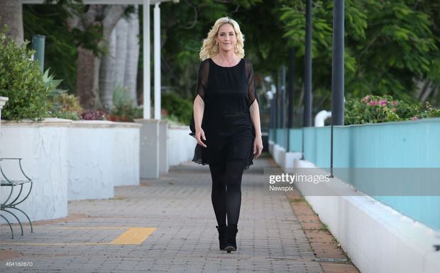 Tall blonde walking.