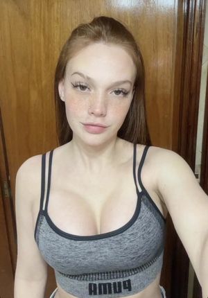 ridiculously hot redhead teen showing off her body