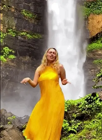 Sexy dance under the waterfall