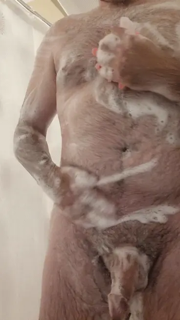 Dad bod lathering up and washing cock...