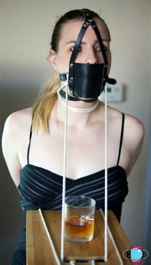 Bound and gagged serving woman
