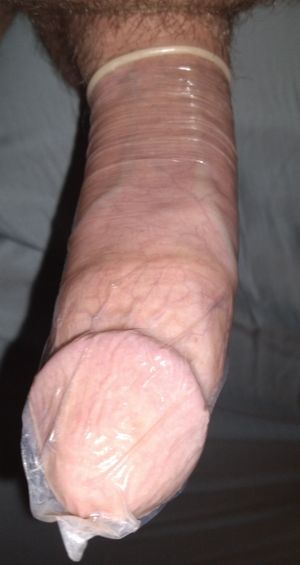 More of my thick cock in a condom