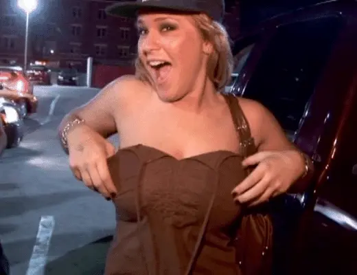 Drop top and exposing her melons.