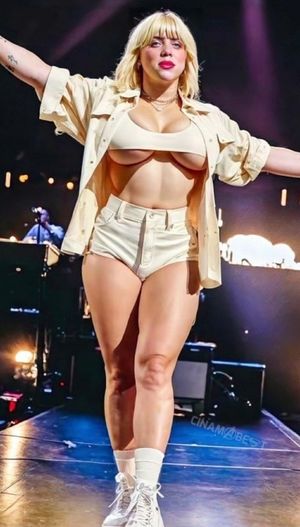 Billie showing lots of Breasts and hot body on stage